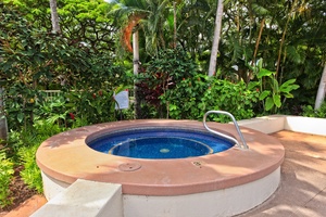 Relax in the hot tub in the center of the palm fringed Fairways at Ko Olina.  