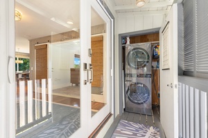 Washer and dryer in-unit, tucked just off the entryway for easy access during your stay.