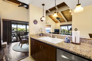 The whole group can be a part of conversation from this open style kitchen