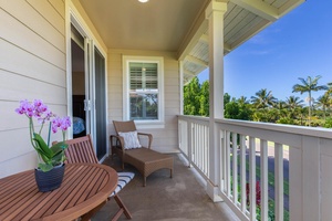 Sip coffee on the primary suite’s private lanai with peaceful views.