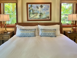 The second bedroom twin beds converted into a King bed.