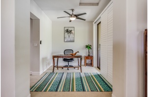 The primary bedroom work station has direct access to the patio