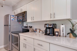 Well-equipped kitchen with modern appliances and essentials.