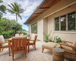 Enjoy this cheerful seating just outside of the second bedroom