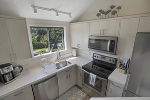Start your morning here with coffee and breakfast in a clean, well-equipped kitchen.