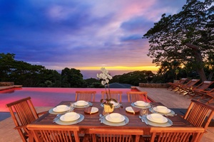 Outdoor dining by the pool.