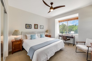 The twin beds can be converted into a king upon advance request. A workspace window nook provides a desk and a lovely view out over the treetops.