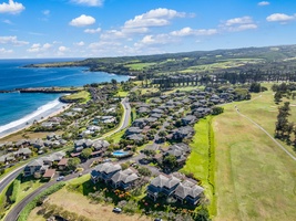 This aerial view of Kapalua Ridge 2321 shows sweeping golf course and oceanfront vistas.