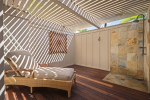 Spacious outdoor shower area.