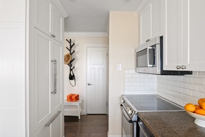 Bright and airy kitchen nook, perfect for morning coffee before a day at the beach.