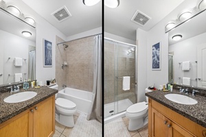 Ensuite and guest baths both feature modern tile surrounds and full tub-shower combos.