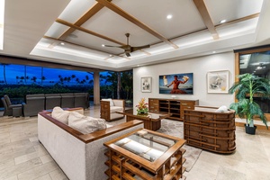 Evenings come alive in the great room with golden hour views and cozy ambiance.