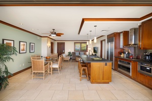 Your stunning open-concept kitchen flows seamlessly into elegant dining and living spaces, perfect for gathering and creating memories.