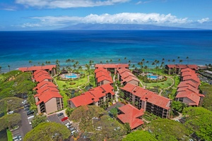 Papakea K-105 sits oceanfront with sweeping views and two pools nestled among lush tropical grounds.
