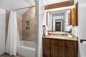 Remodeled guest bathroom across from the bedroom