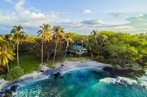 Idyllic Beachfront Locale Nestled Among Lush Tropical Greenery