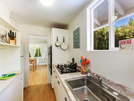The guest cottage features a full kitchen, perfect for home-cooked meals.
