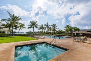 Experience refreshing dips at the Peninsula's communal pool.