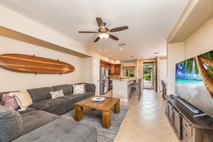 Open-Plan main room, which seamlessly blends the living, dining, and kitchen areas.