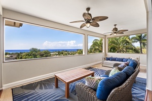 Outdoor lanai with ocean views, designed for unwinding in comfort and style.