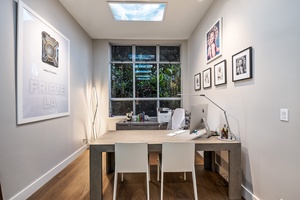 Dedicated workspace with peaceful garden views—ideal for digital nomads.