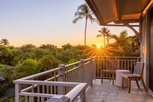 Seating area off of the third bedroom offers stunning sunset views.