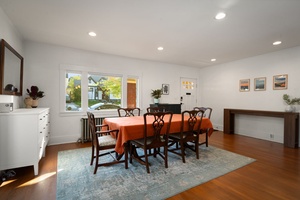 Share breakfast or evening plans around the bright dining table with natural light.
