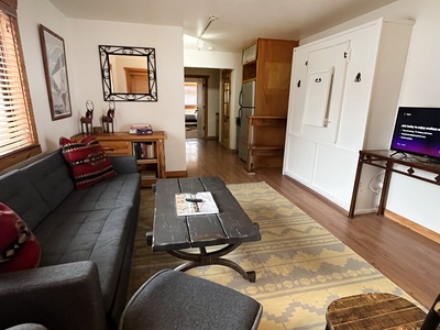 Living room looking into kitchen