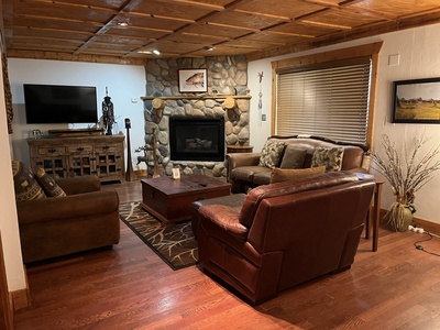 Living area with gas fireplace and Smart TV