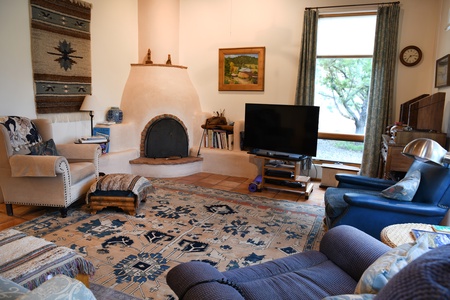 Living Room with working Kiva Fireplace
