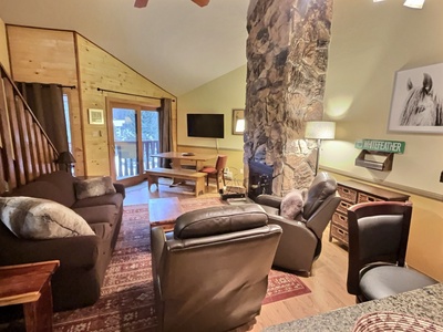 Livingroom with two recliners, couch and fireplace