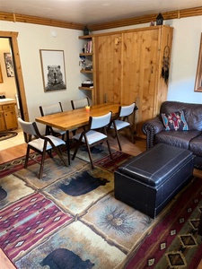 Living Area with Table and Chairs set for Dining