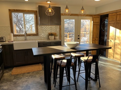 Dining area and kitchen in evening light