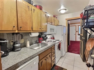 Galley Kitchen Between Living Room and Bedroom