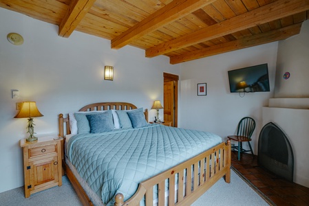 King bedroom with valley views and private second storey deck