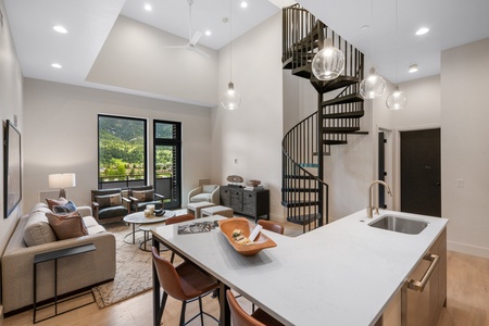 Kitchen bar area with staircase