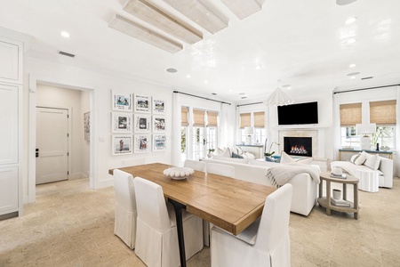 Unwind in this bright, airy space where exposed beams meet modern comfort—your perfect spot for morning coffee or evening conversations.