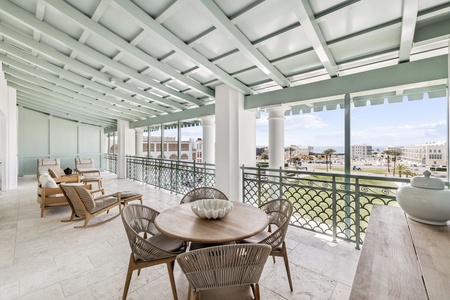 Relax on your spacious covered terrace with elegant dining and seating areas, where stylish comfort meets breathtaking views.