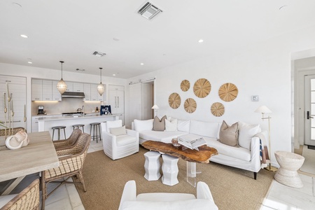Relax in this bright, airy open-plan space where modern coastal style meets comfort—your perfect retreat for memorable moments.