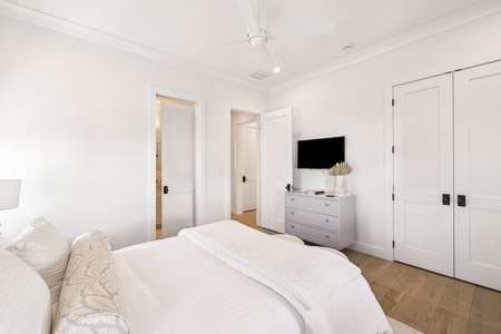 Drift off in this serene bedroom with crisp linens, gentle lighting, and thoughtful touches for your perfect retreat.
