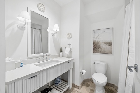 Freshen up in your private, beautifully appointed bathroom with beach-inspired décor and modern fixtures designed for your comfort.