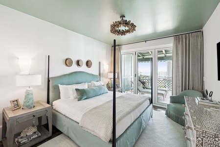 Drift into peaceful sleep in your elegant bedroom, where soft sea-green tones and luxurious linens create the perfect sanctuary for rest.