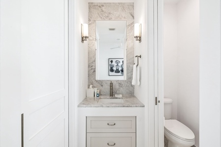 Step into your elegantly appointed bathroom with marble accents, modern vanity, and thoughtful touches that make your daily routine feel luxurious.