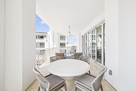 Your private terrace offers the perfect spot to enjoy morning coffee or evening wine with stylish outdoor dining for four.