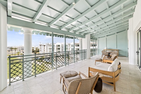 Unwind in your spacious covered terrace with comfortable seating and stunning views of the surrounding area.