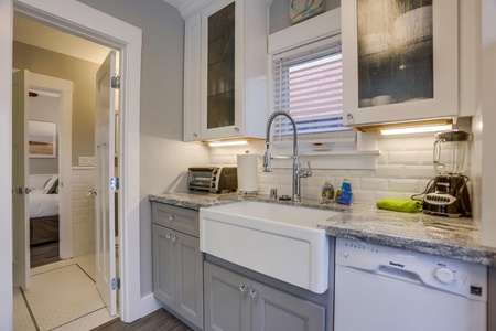 Kitchen and adjacent bathroom