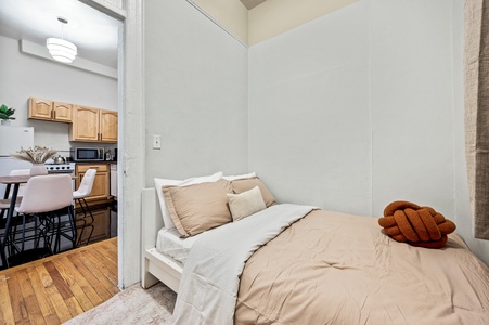 Sink into your cozy bed with soft linens and pillows, while your open-plan kitchen awaits morning coffee.