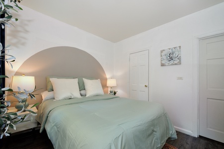 Drift into peaceful slumber in your serene bedroom sanctuary, where soft sage linens and gentle lighting create the perfect retreat.