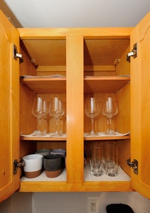 Your kitchen cabinet comes fully stocked with wine glasses, drinking glasses, and ceramic mugs for cozy evenings in.