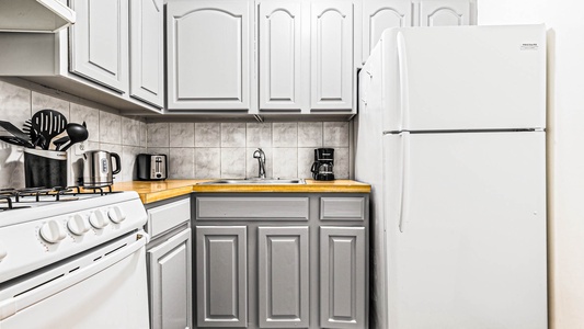 Your fully equipped kitchen features modern appliances and plenty of counter space for preparing meals during your stay.